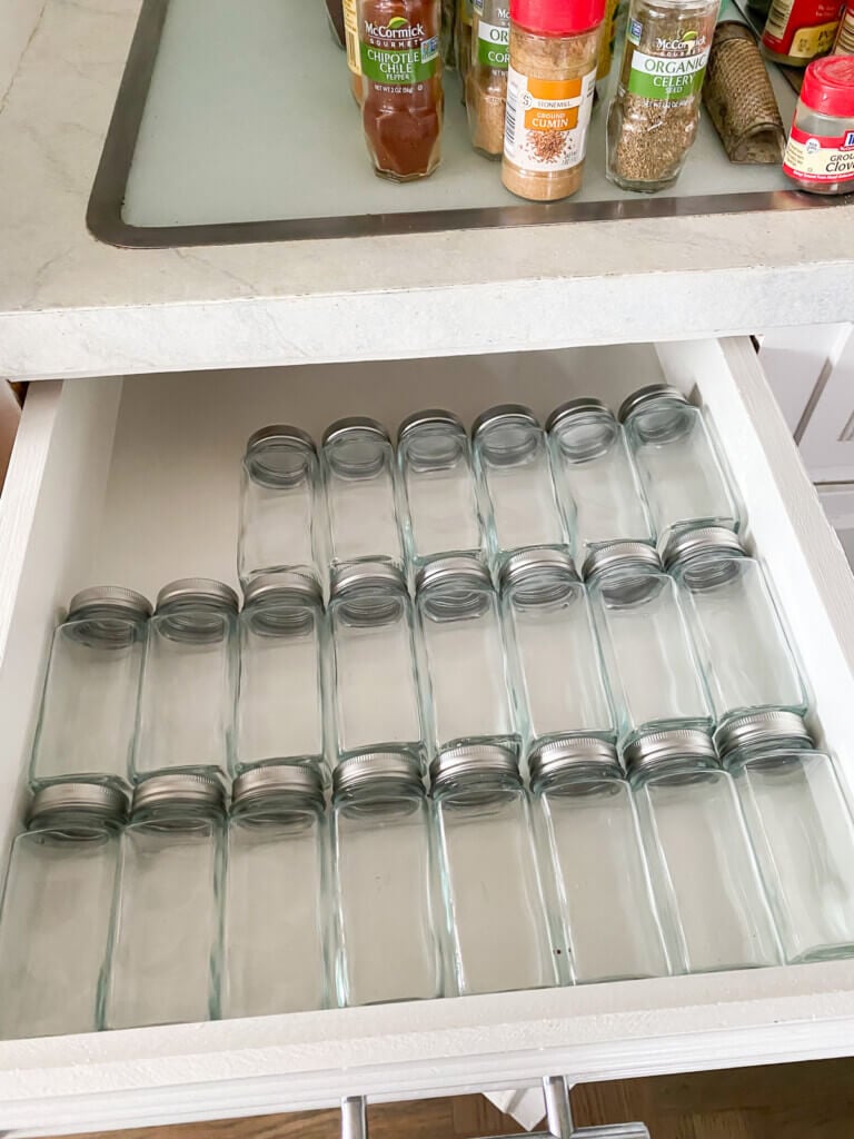 empty spice jars in a drawer