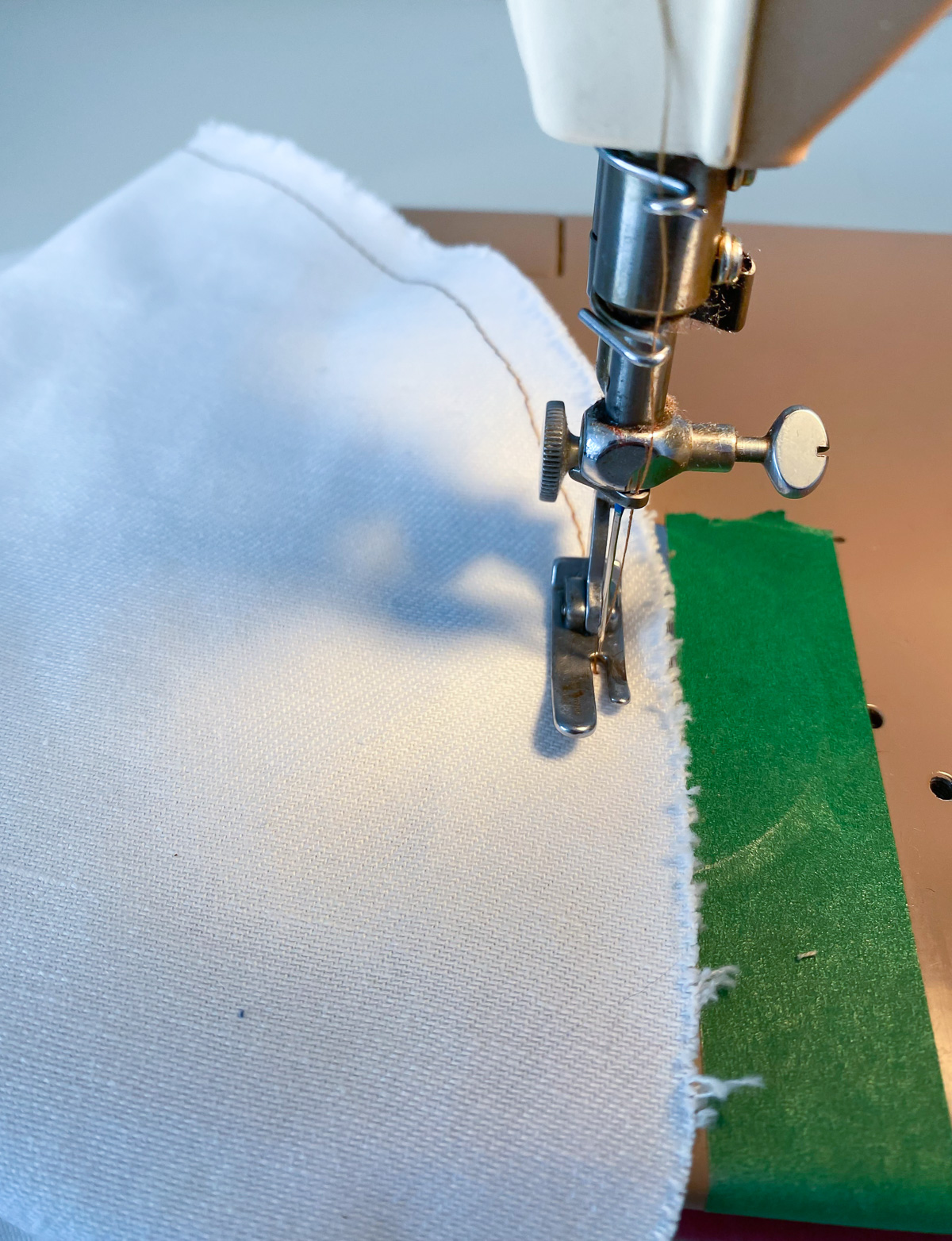 sewing an outline stitch on letter appliques