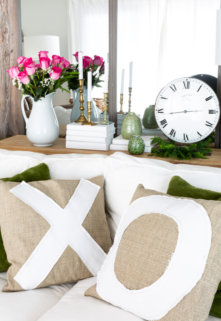 x and o throw pillows on a sofa