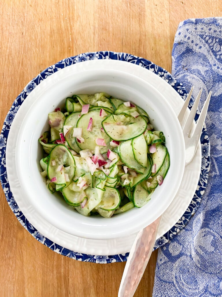 crunchy cucumber salad in a bowl on a table
