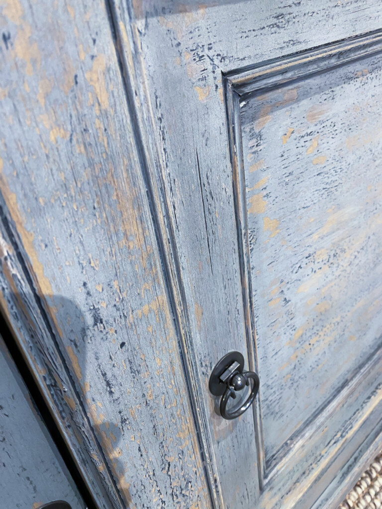 blue aged painted finish on sideboard