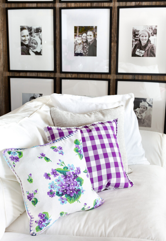 Purple and white old cloth napkins made into DIY throw pillows.
