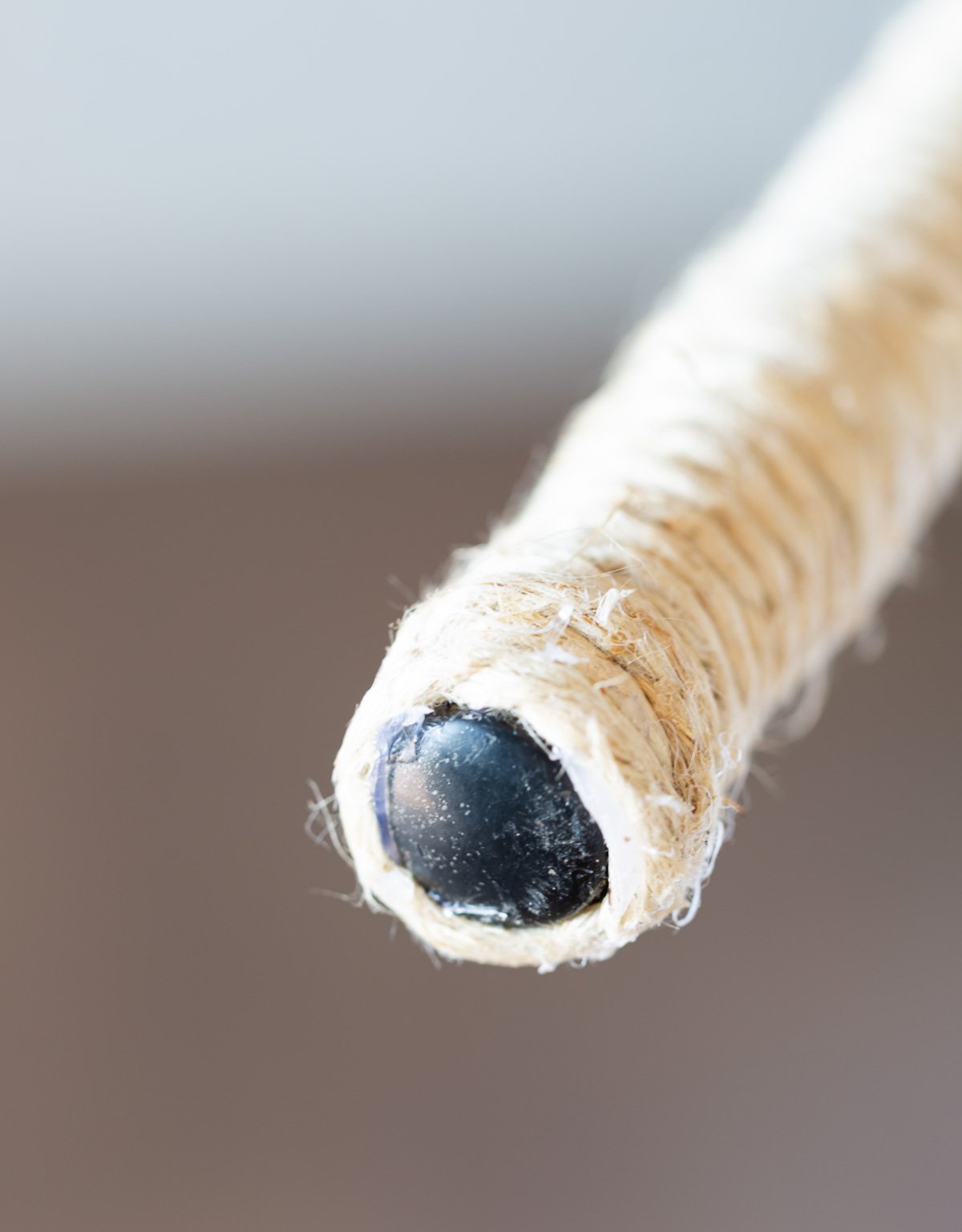 how to end the wrapped twine on the leg of the floor lamp.