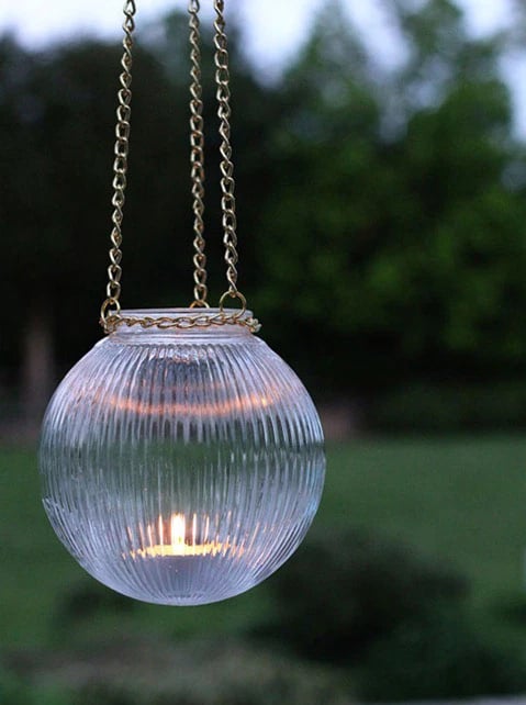 Glass light fixture globe turned into a outdoor hanging light