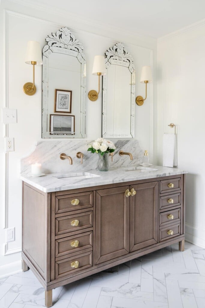 master bathroom makeover after photo. Marble counter top brass accents