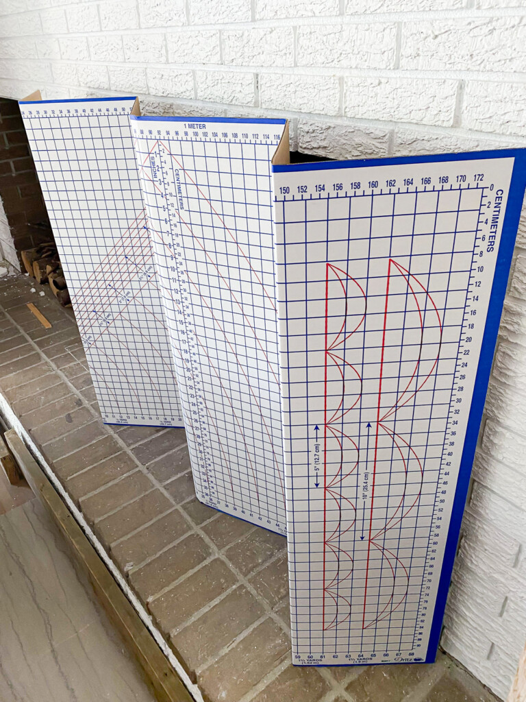 Easy DIY fireplace screen for summer can be made using a cardboard pattern cutting board.