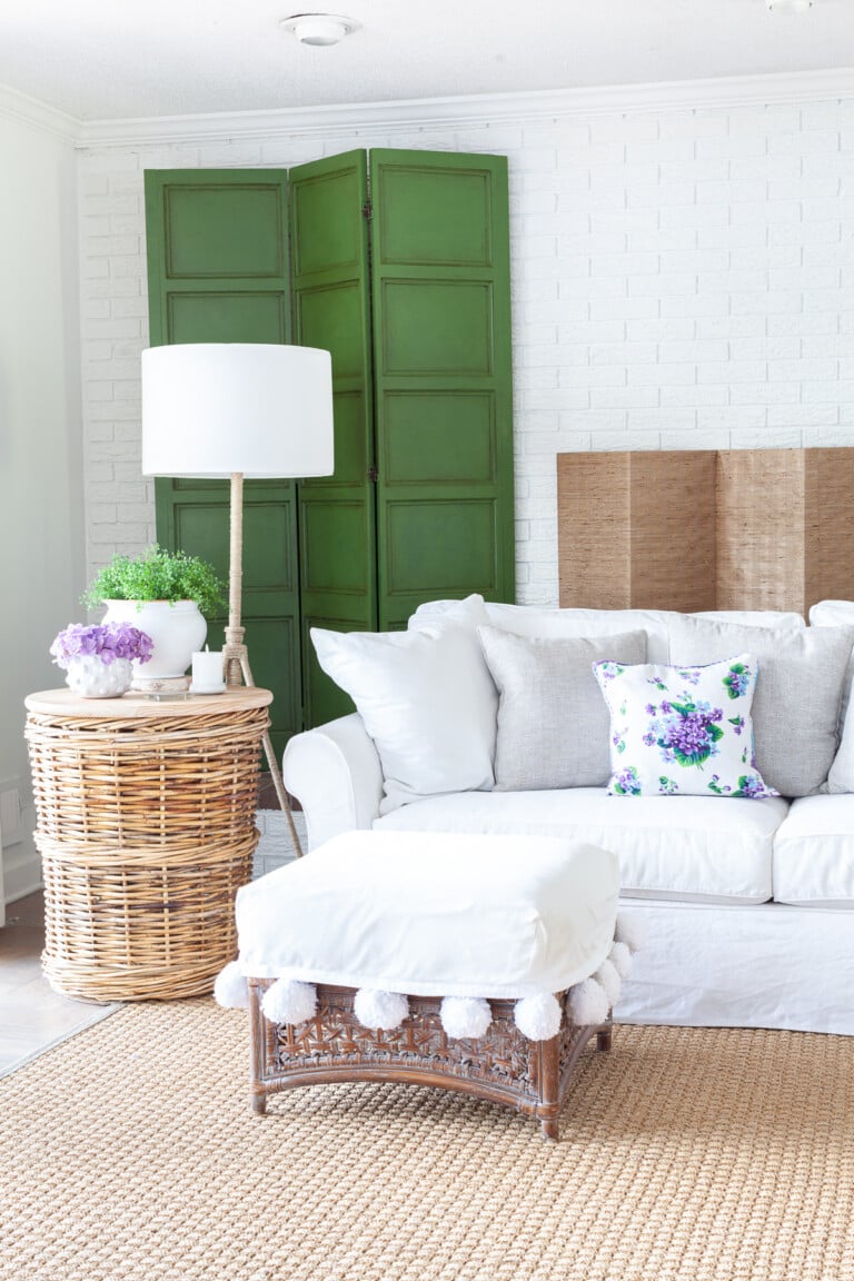 Living room fireplace wall decorated for summer.