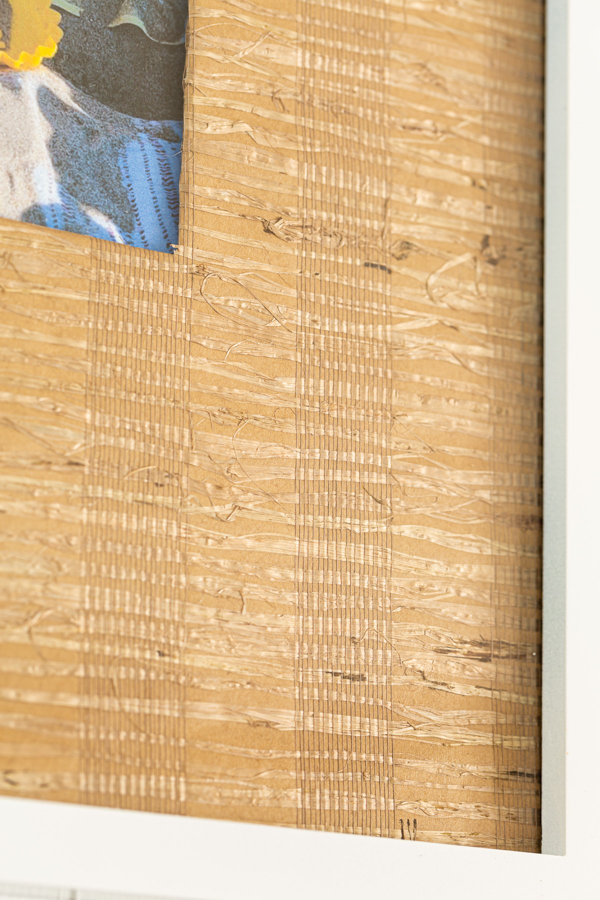 close up of grasscloth mat in frame