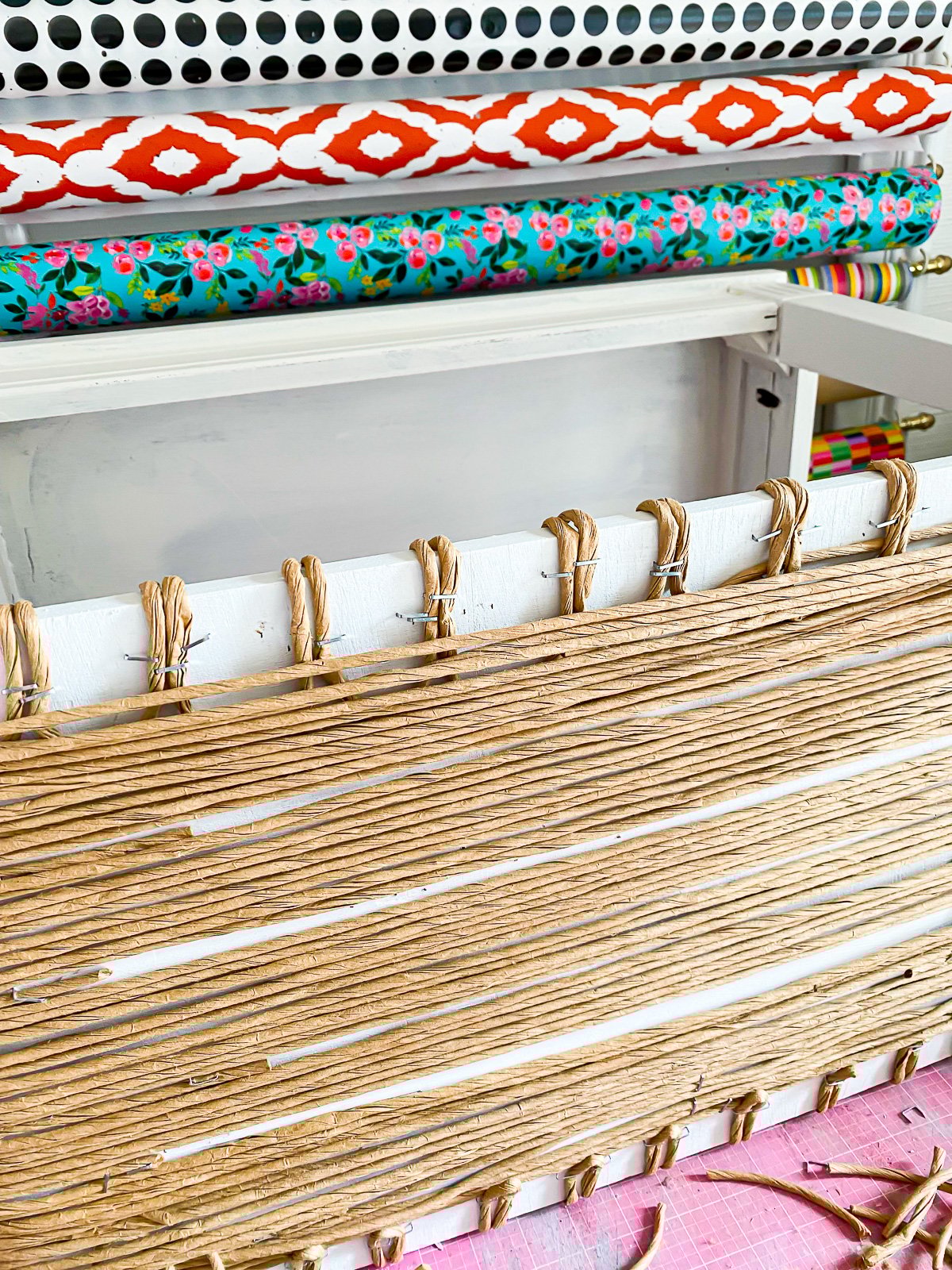 how to secure loose ends of fiber rush under shelf on side able makeover