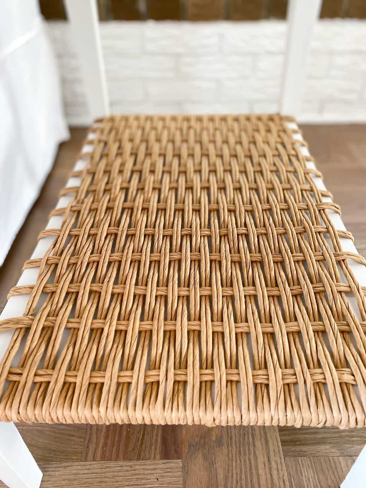 Fiber rush woven on a white chalk painted side table.