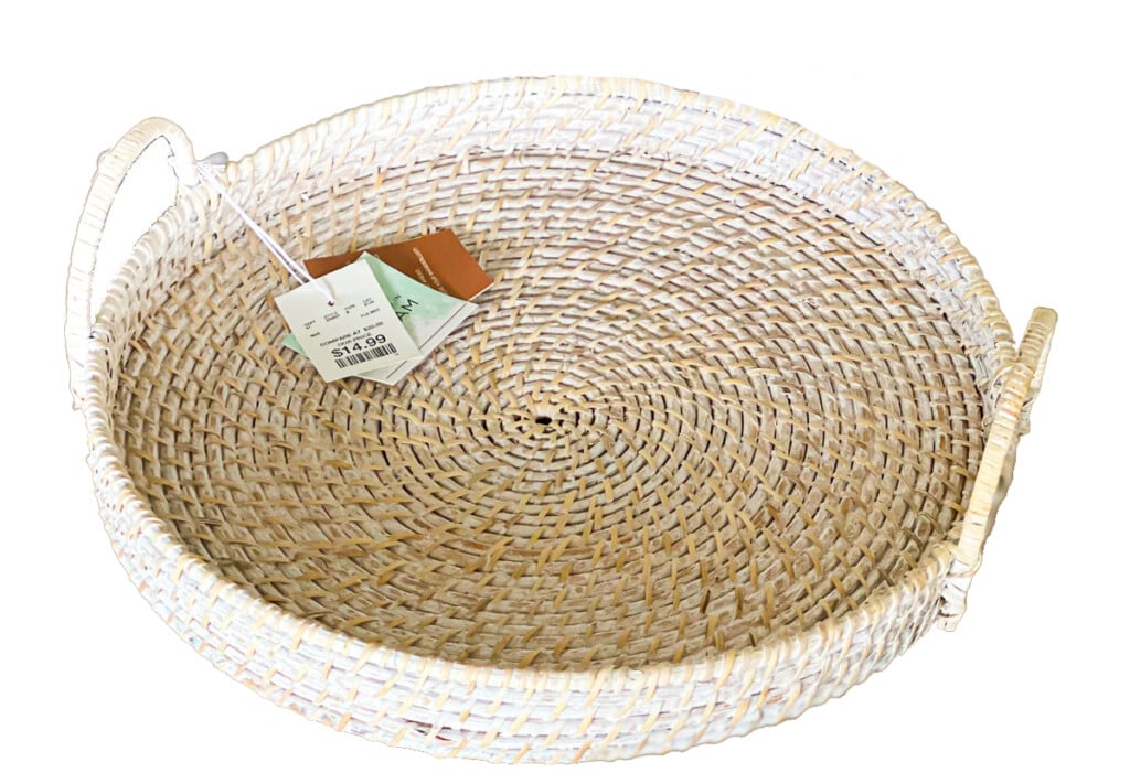 whitewashed round wicker tray with handles