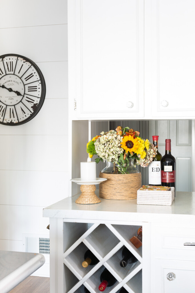 White kitchen with fall decor on counter