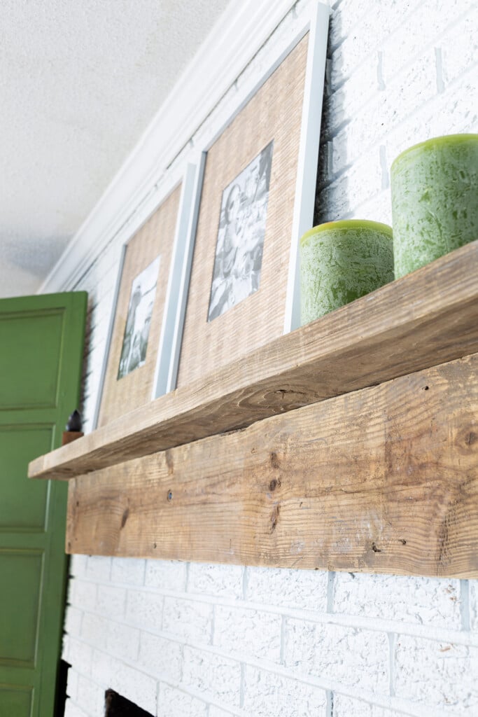 looking up at newly built rustic wood fireplace mantel