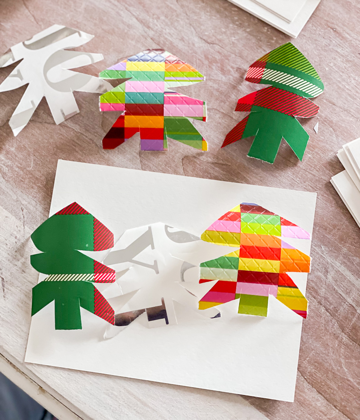 How to make simple Christmas cards using gift wrap.