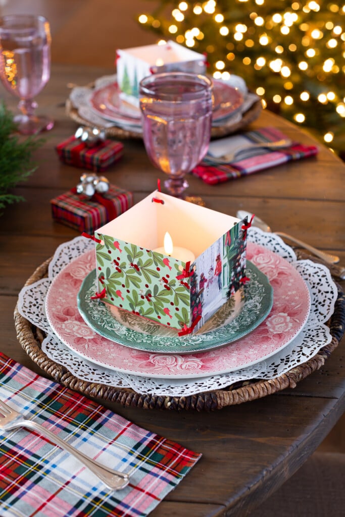 red and white dinner plates set on dining table for Christmas