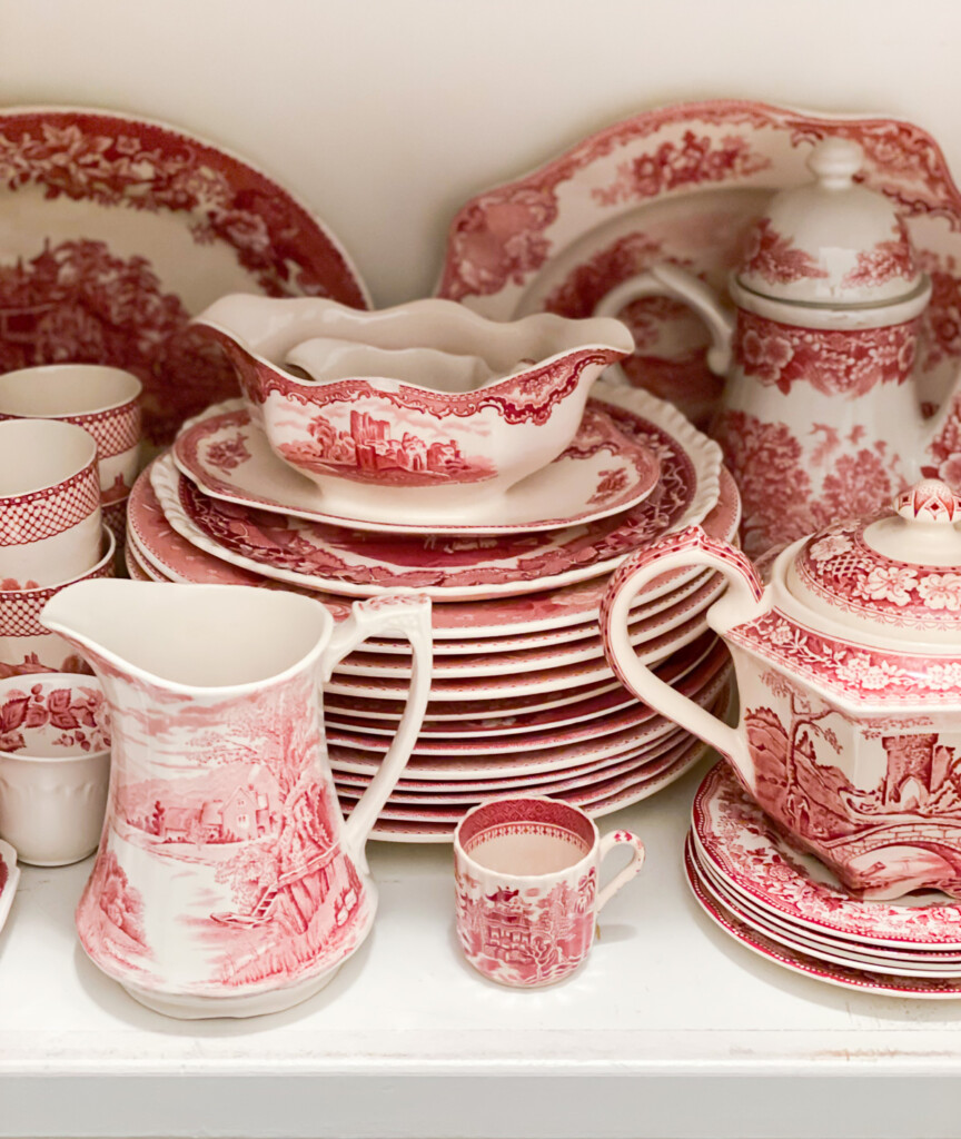 Red and white vintage china in china closet