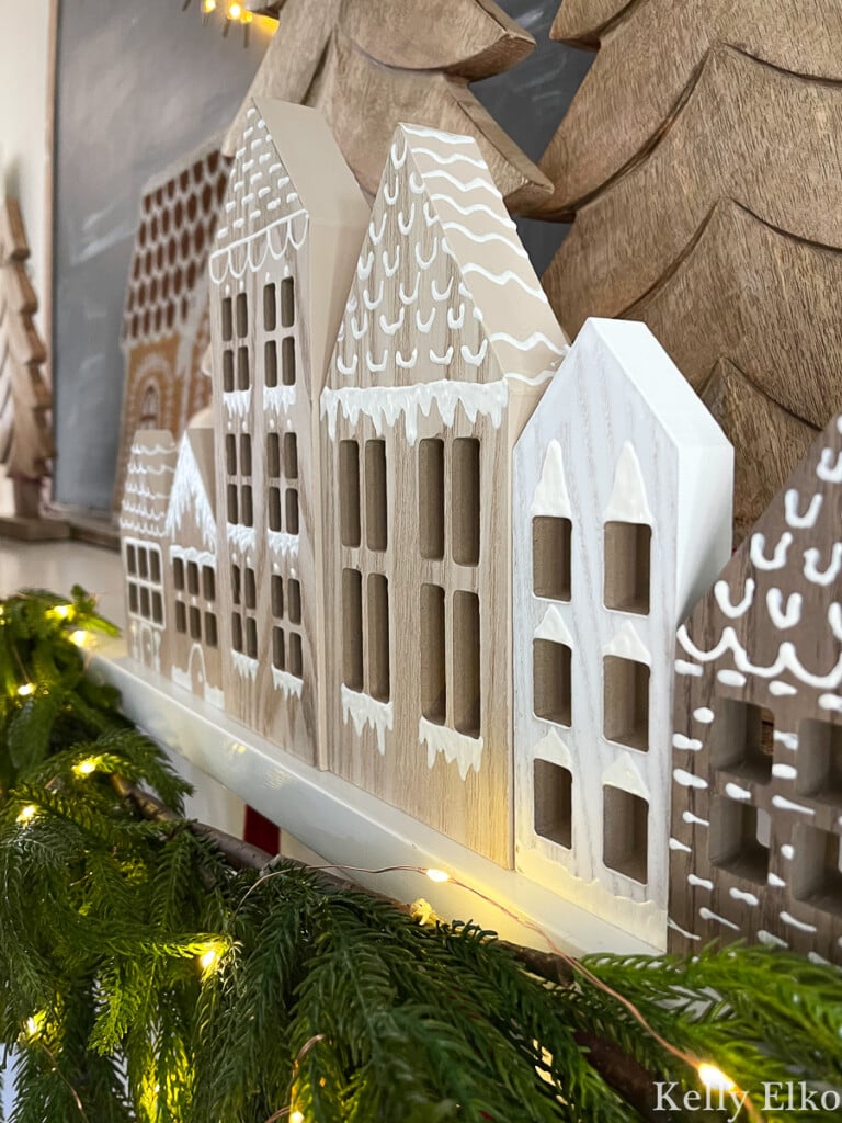 DIy wood gingerbread houses on a Christmas mantel