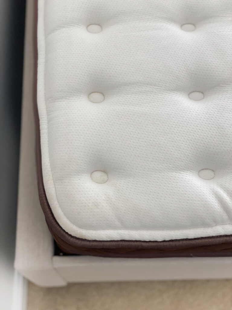looking down on tufted top of a Christeli Charleston mattress