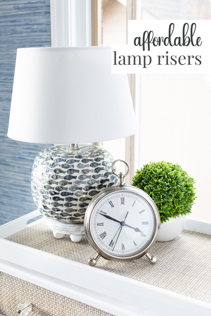 blue and white lamp with fish pattern on an a lamp riser. Text overlay says affordable lamp risers