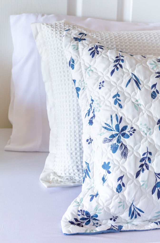 Bedsure pillows and shams on a bed with white sheets