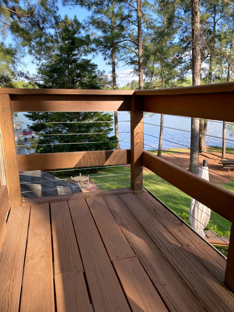 DIY cable railing installed on existing wood railing