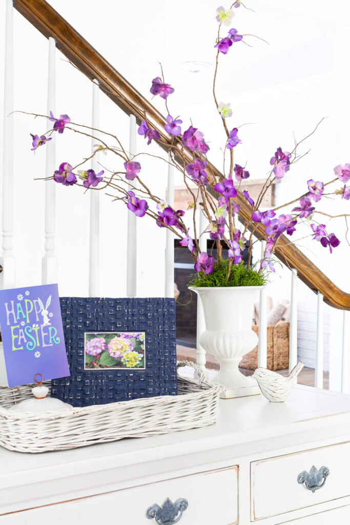Easter decor in a blue white and lavender color scheme.