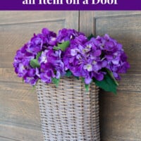how to invisibly hang an item on a door or window frame