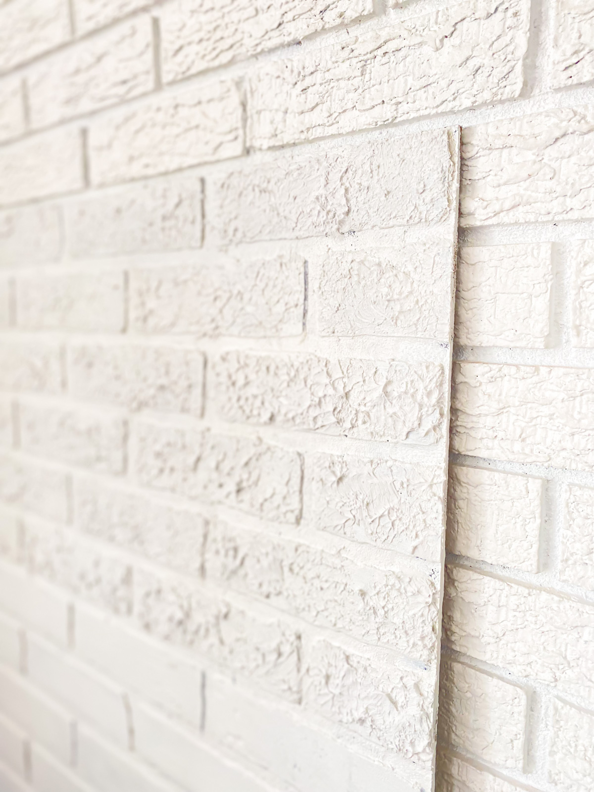 image showing texture difference on a faux brick panel
