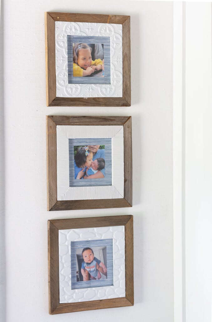 A set of 3 thrift store frames upcycled with scraps of wood, tile and wallpaper.