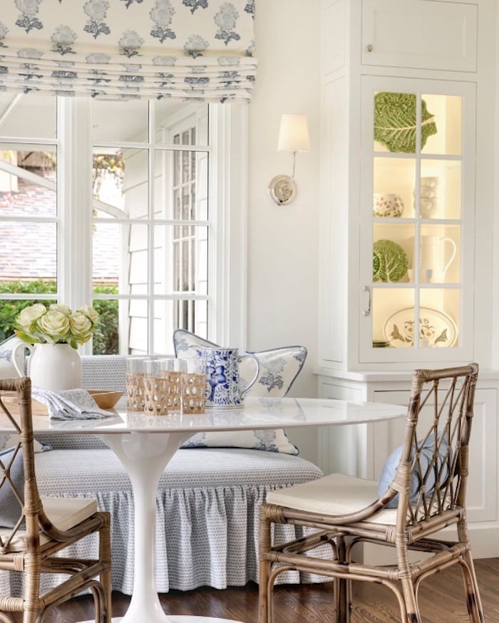 pretty white blue and green decorated kitchen table.