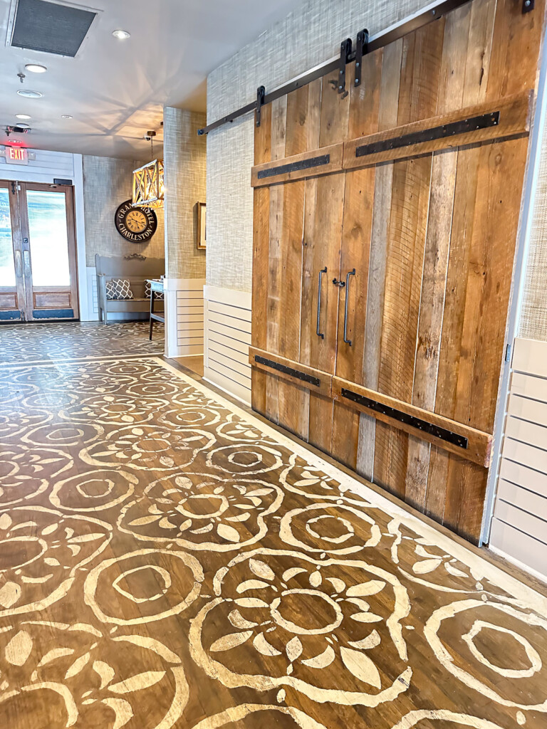 Tavern and Table restaurants stenciled wood floor.