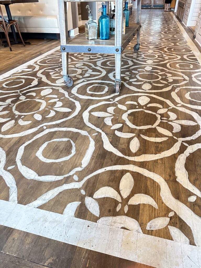 Tavern and Table restaurants stenciled wood floor.