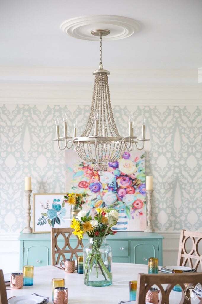 Pretty and colorful dining room decorated by Ashley Mills of The Handmade Home.