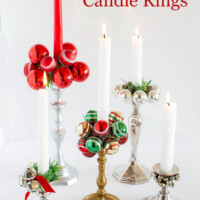a collection of candle holders with rings made with Christmas ornaments.