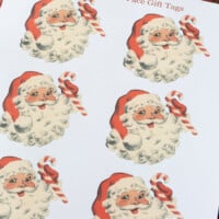 free printable sheet of vintage Santa face gift tags, name tags or to use a table setting place cards.