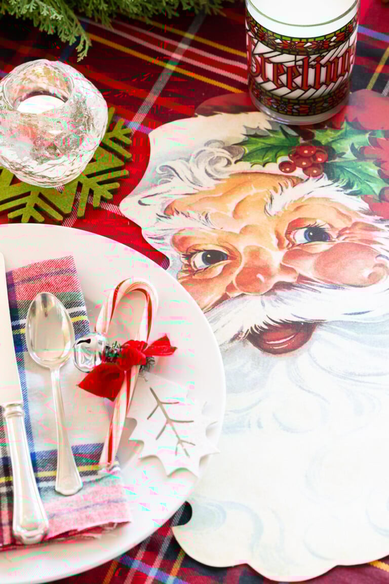 christmas day table setting idea with a Santa and red themed table