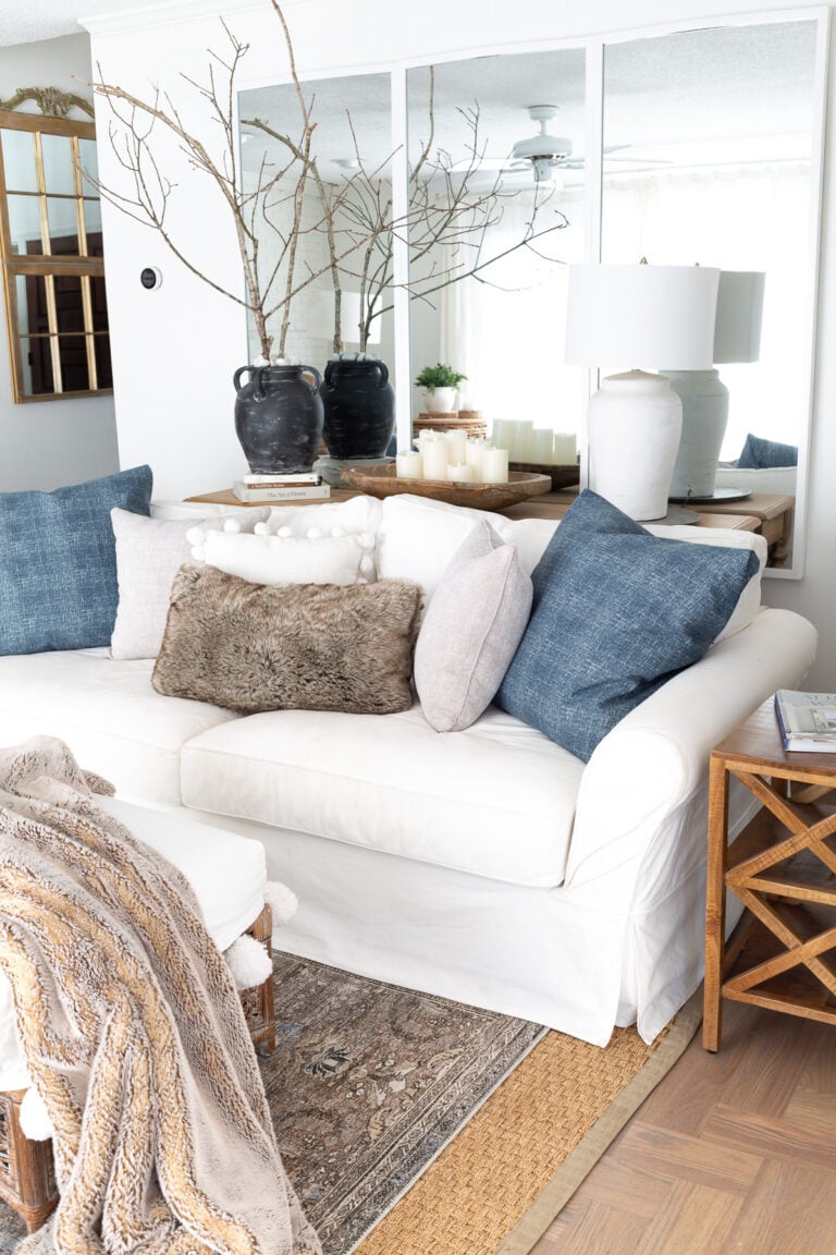 blue and white living room decorated for winter.