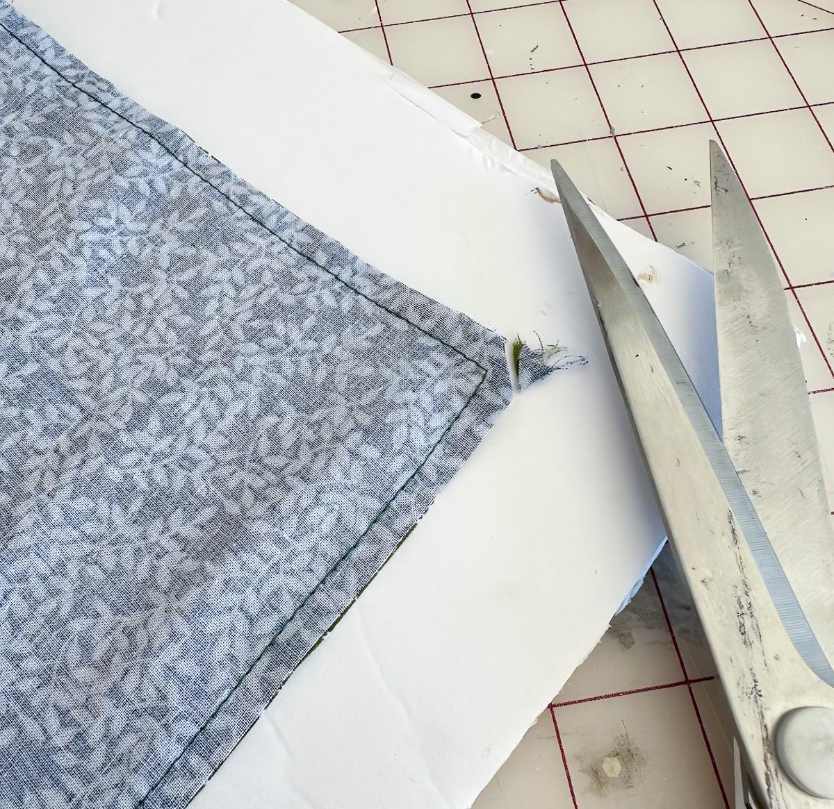 snip corner of sewn fabric with scissors