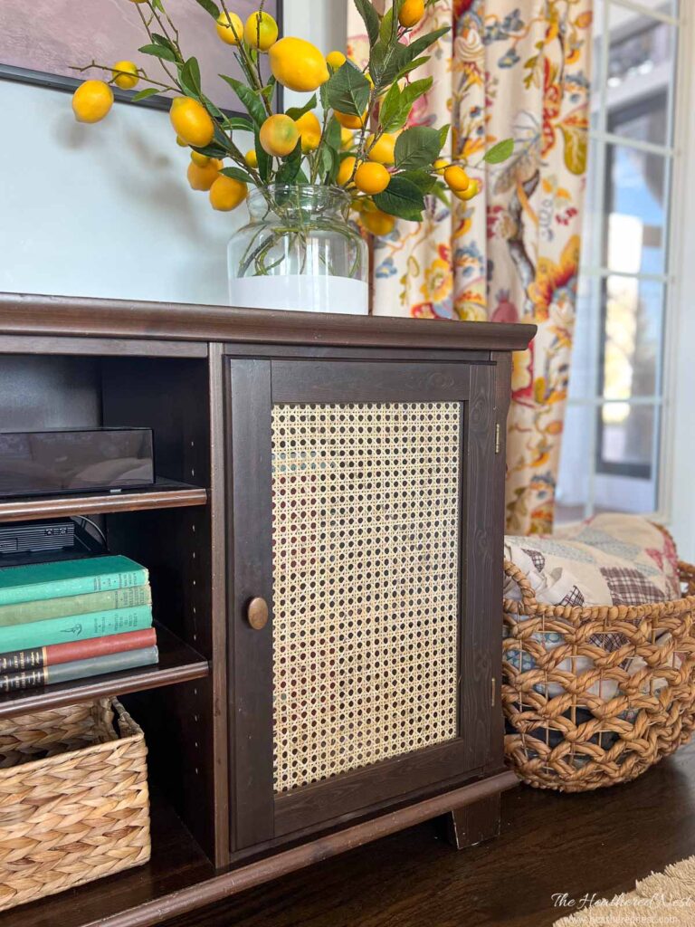 DIY cane cabinet door makeover in a living room.
