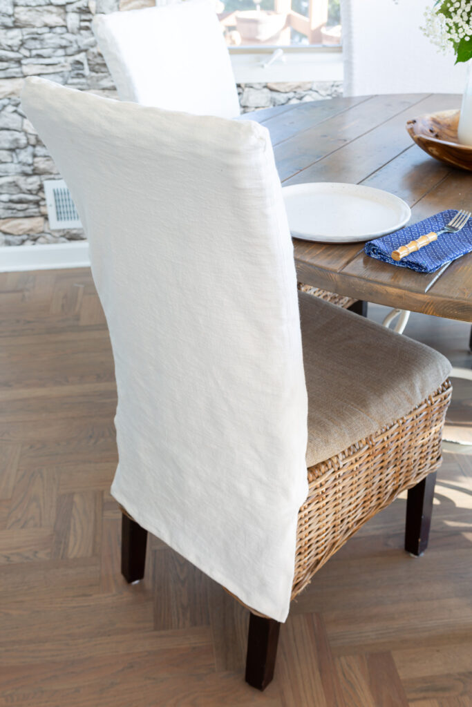 newly made white fabric slipcover on kitchen dining chair.