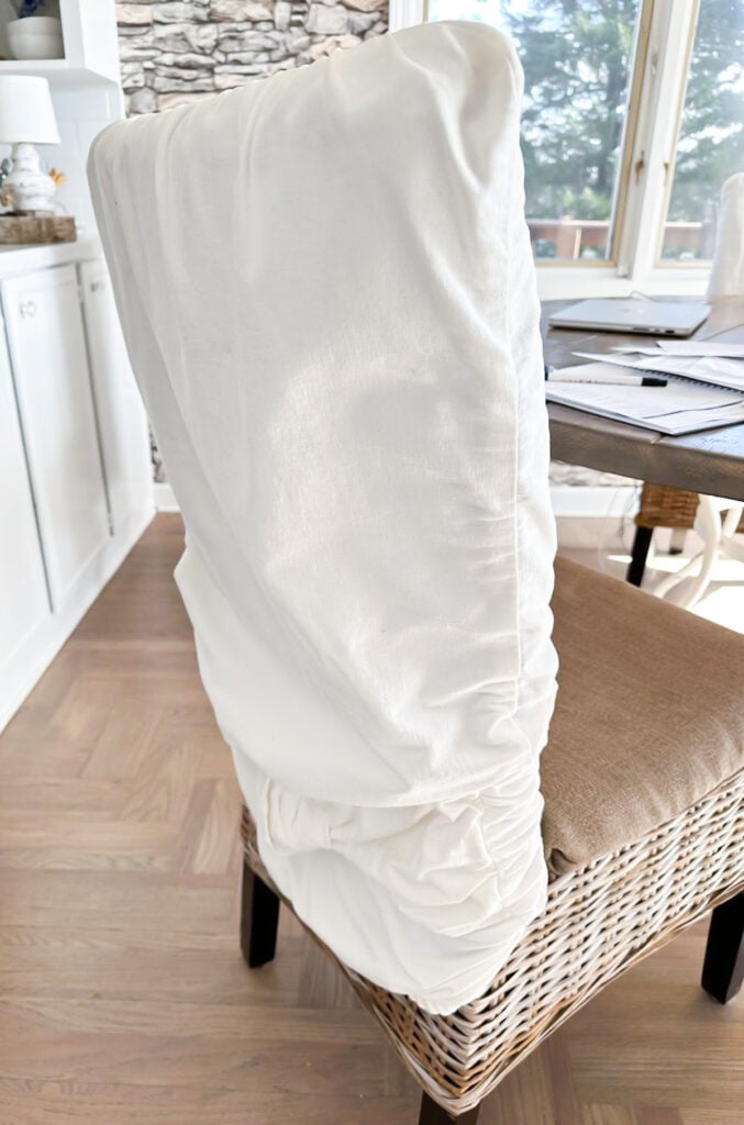 worn and stretched out dining chair back slipcover