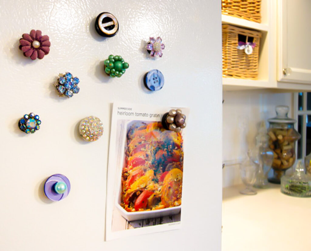 old vintage clip on earrings made into refrigerator magnets.