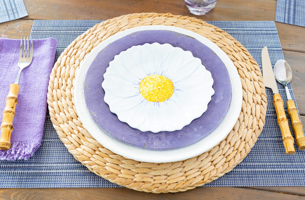 Decorate Easter table place settings in layers.