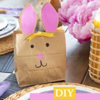 DIY Easter bunny goodie bag placed on a Easter table near each place setting.