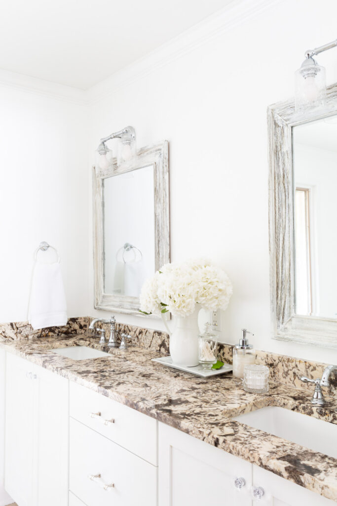 white flowers on bathroom counter