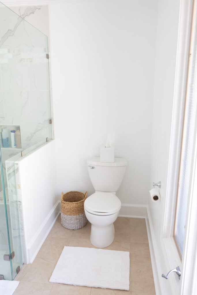 white walls and toilet in a bathroom
