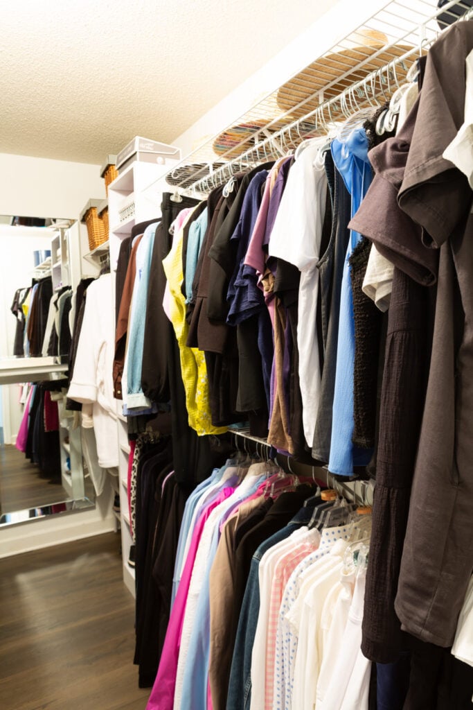 Clothes closet after getting cleaned out and reorganized.