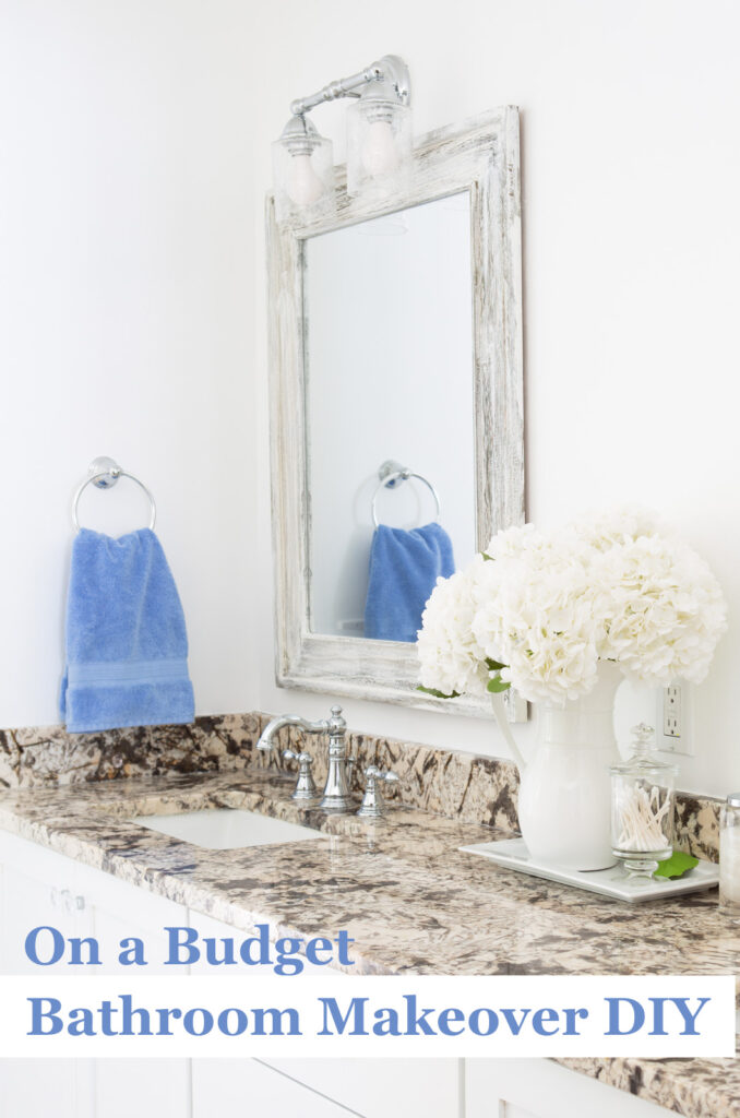 On a budget Bathroom makeover DIY white/neutral after with a color pop of sky blue.