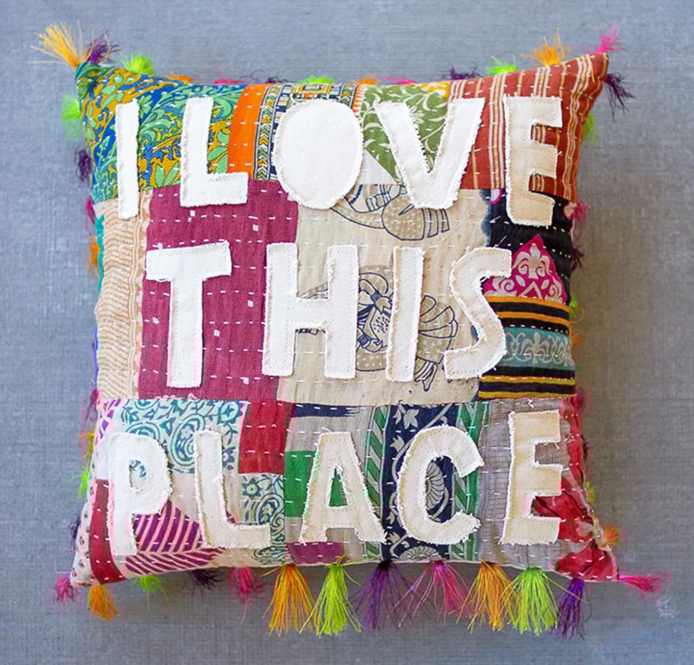 Throw pillow that says I love this place