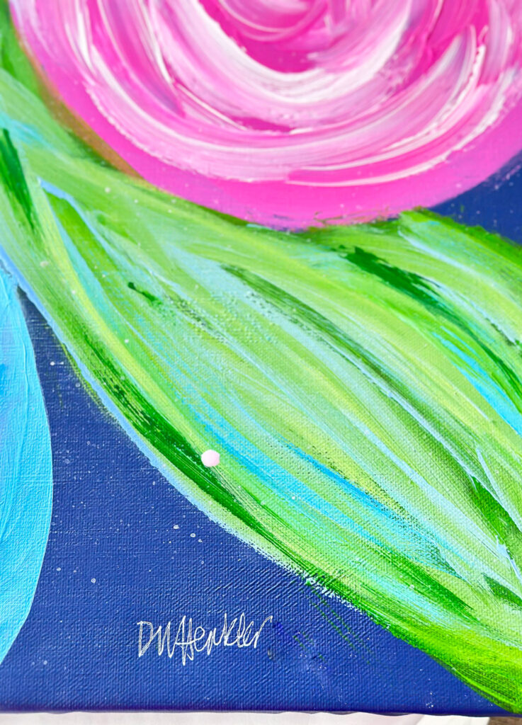 close up of the brush strokes of a leaf painted on a large art canvas.